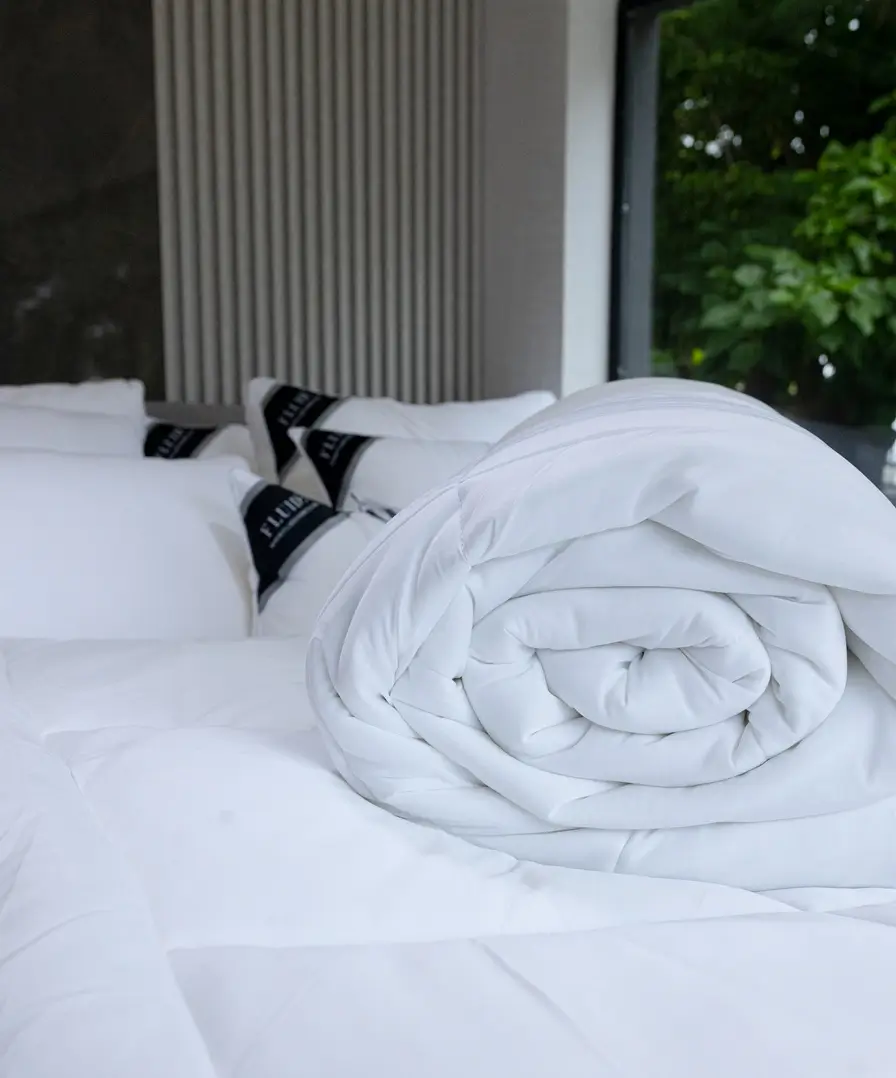 all-season duvet with breathable shell technology, lightweight yet warm, ideal for year-round comfort.