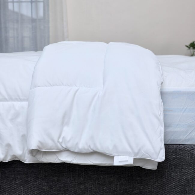 lightweight duvet available in king and grand king sizes. Breathable down-alternative fill for airy comfort and cooler nights.